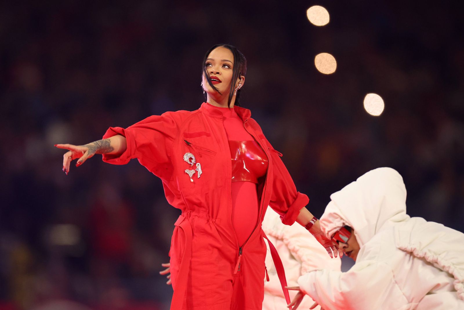 Rihanna Announces Baby #2 + Looks Red Hot in Custom Loewe, Alaia, and Salomon x Margiela Sneakers at Her SuperBowl 2023 Performance!