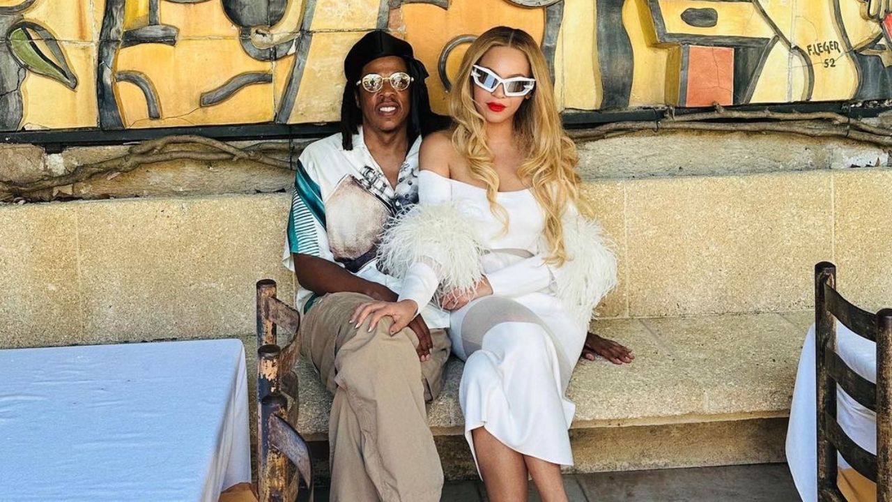 Beyoncé Wore a White Feathered LaPointe Dress and Brandon Blackwood handbag with Jay-Z in Jil Sander while Exploring Nice, France