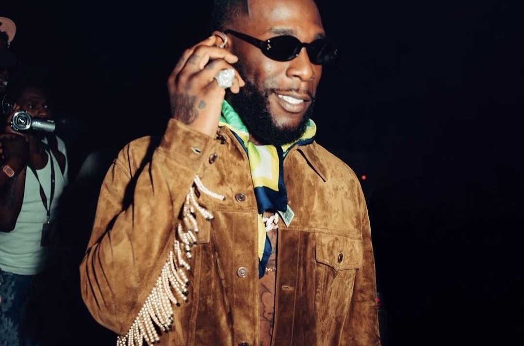 Burna Boy Wore a $8,200 Beaded Fringe Celine Jacket While in Portugal