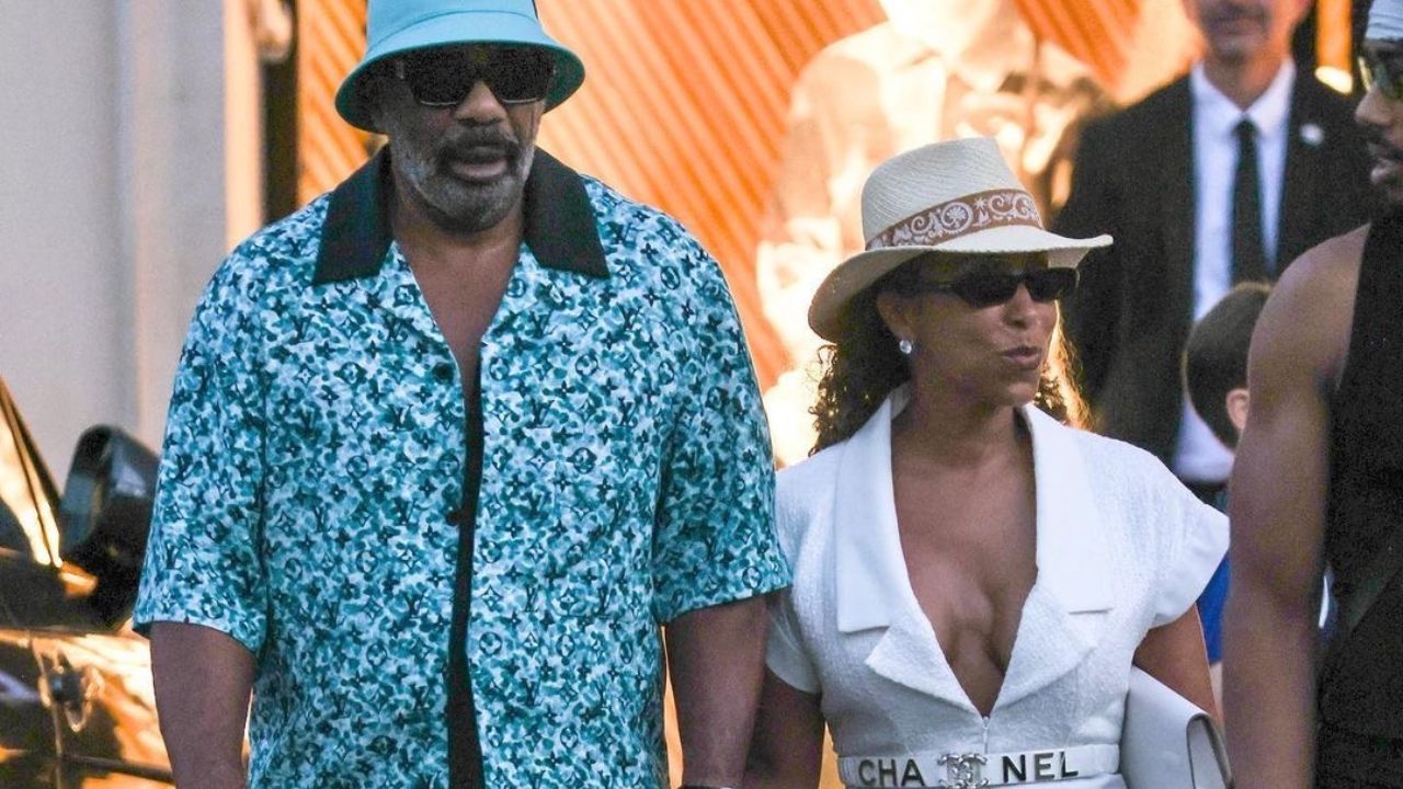 Steve Harvey Wore a $1700 Louis Vuitton Monogram Shirt with Wife Marjorie Who Opted for a White Chanel Jumpsuit While Vacationing in St. Tropez